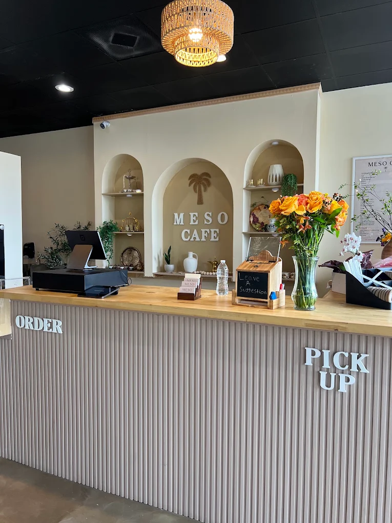 The order and pickup counter, with arched alcoves behind it